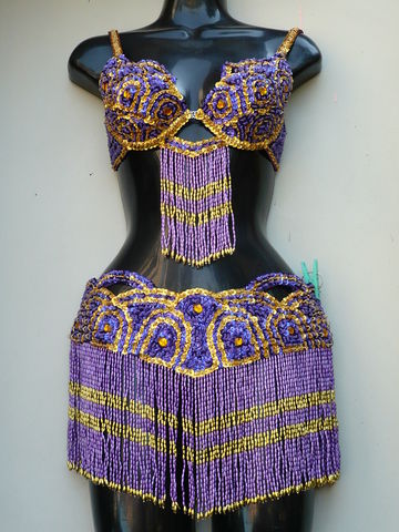 Traje arcos morado-oro $1600