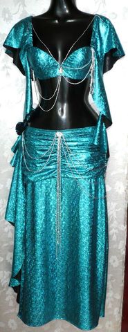 Conjunto en licra laser bra con cintas al hombro y falda $1250