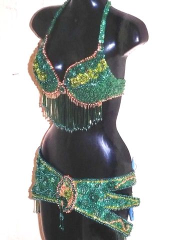 Traje calado verde varios-oro $1600