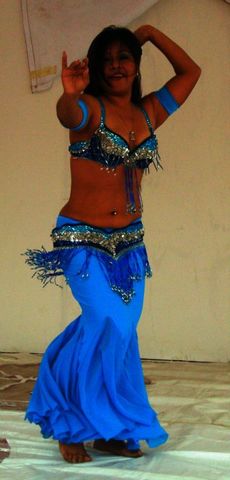 Naymme viste falda sirena estrella turquesa.