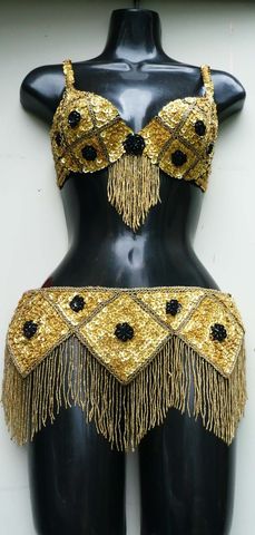 traje rombos oro con negro $1600