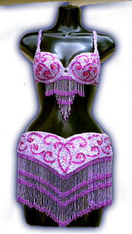 traje lila con bastones fiusha $1600