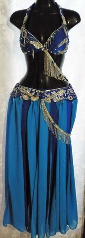 traje rey-plata-turquesa, bra, fajin y falda base con tiras. $1900