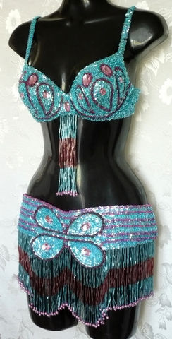 Traje flor turquesa-lila $1600