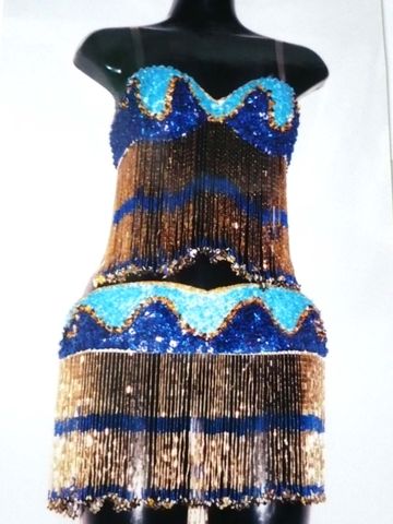 Traje turquesa-azul rey-oro $1600