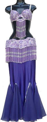 Traje arcos lila-plata $1600, falda $360