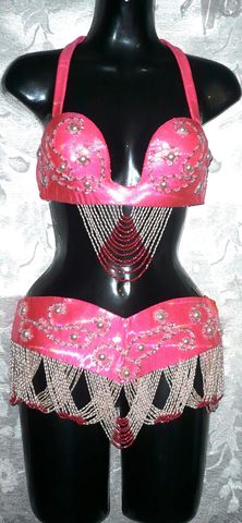 Conjunto laser coral con perla $1100