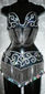 Conjunto negro-plata, forrado en licra laser, colores varios $1100