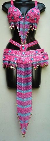 Traje rosa mex-turquesa $1600